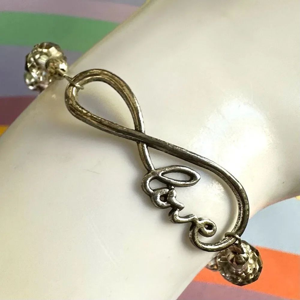 Silvertone beaded Infiniti love bracelet